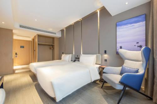 Imagen de la habitación del Hotel Atour Zhengzhou High-Tech Star Union. Foto 13