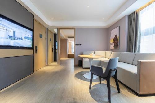 Imagen de la habitación del Hotel Atour Zhengzhou High-Tech Star Union. Foto 14