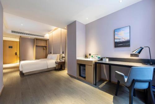 Imagen de la habitación del Hotel Atour Zhengzhou High-Tech Star Union. Foto 15