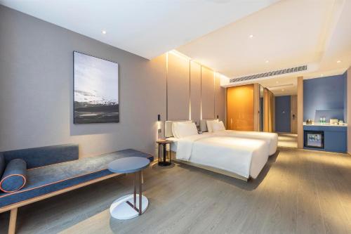 Imagen de la habitación del Hotel Atour Zhengzhou High-Tech Star Union. Foto 16