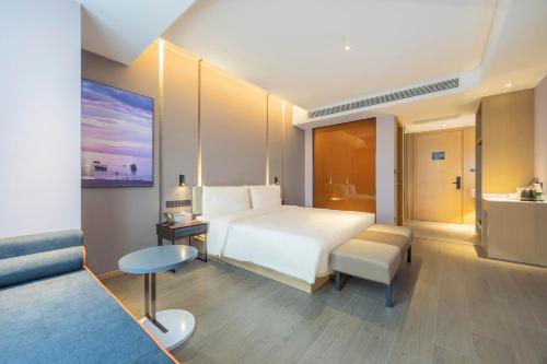 Imagen de la habitación del Hotel Atour Zhengzhou High-Tech Star Union. Foto 18