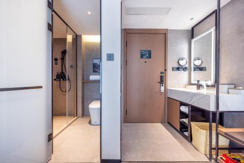 Imagen de la habitación del Hotel Atour Zhengzhou North Dragon Lake Financial Center. Foto 10