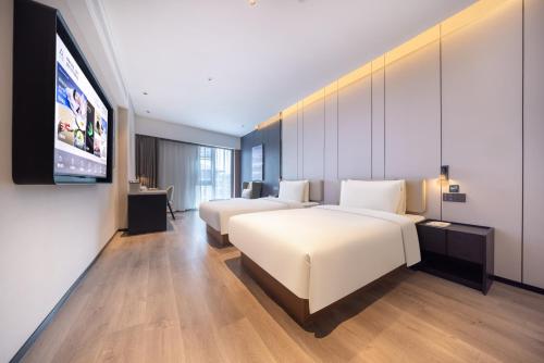 Imagen de la habitación del Hotel Atour Zhengzhou North Dragon Lake Financial Center. Foto 11