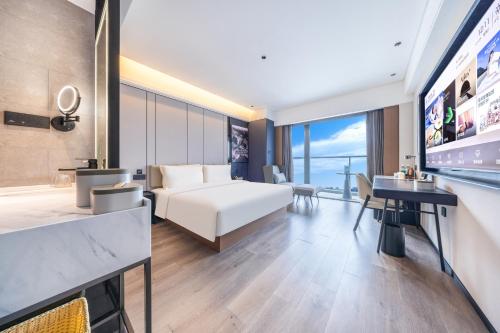 Imagen de la habitación del Hotel Atour Zhengzhou North Dragon Lake Financial Center. Foto 12
