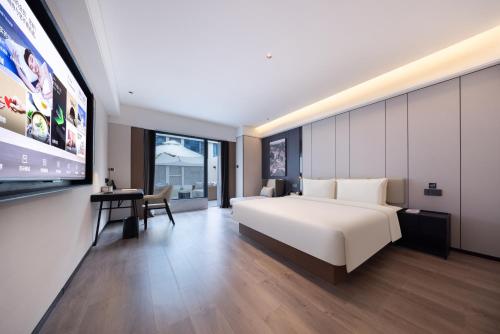 Imagen de la habitación del Hotel Atour Zhengzhou North Dragon Lake Financial Center. Foto 13