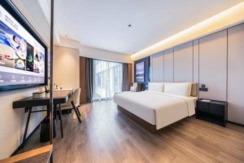 Imagen de la habitación del Hotel Atour Zhengzhou North Dragon Lake Financial Center. Foto 14