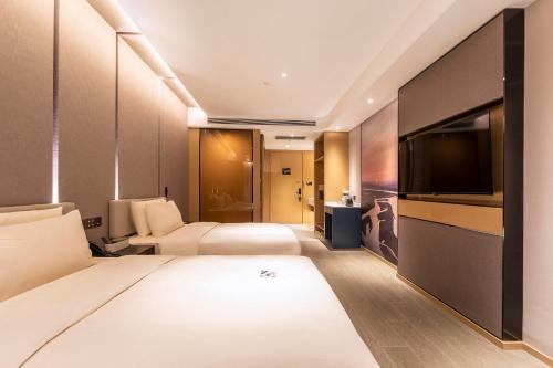 Imagen de la habitación del Hotel Atour Zhengzhou Xinzheng International Airport. Foto 13