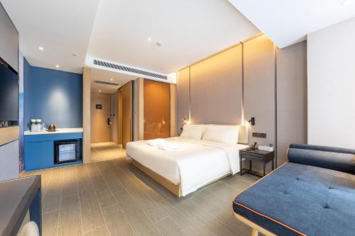 Imagen de la habitación del Hotel Atour Zhengzhou Xinzheng International Airport. Foto 14