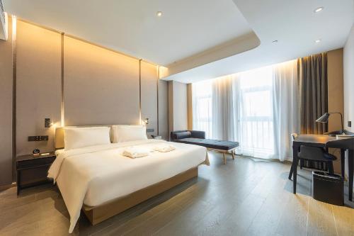 Imagen de la habitación del Hotel Atour Zhengzhou Xinzheng International Airport. Foto 16