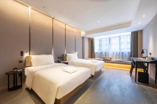 Imagen de la habitación del Hotel Atour Zhengzhou Xinzheng International Airport. Foto 18