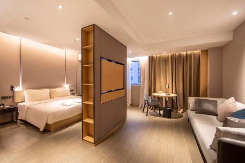 Imagen de la habitación del Hotel Atour Zhengzhou Xinzheng International Airport. Foto 19