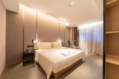 Imagen de la habitación del Hotel Atour Zhengzhou Xinzheng International Airport. Foto 20