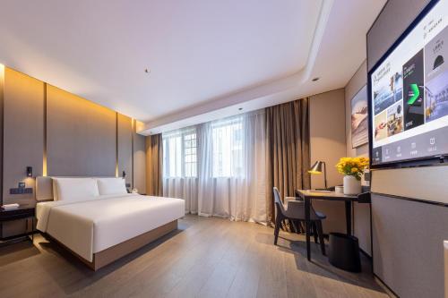 Imagen de la habitación del Hotel Atour Zhongshan Nantou Haiya Colorful City. Foto 18