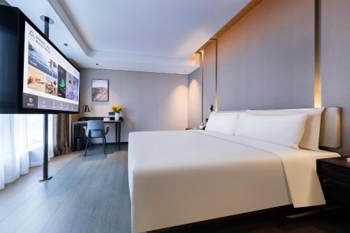 Imagen de la habitación del Hotel Atour Zhongshan Nantou Haiya Colorful City. Foto 20