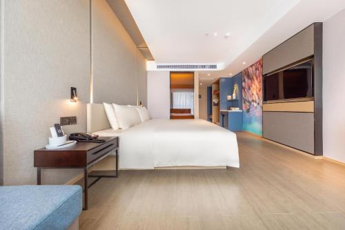 Imagen de la habitación del Hotel Atour Zhongshan North Station V-PARK Plaza. Foto 13