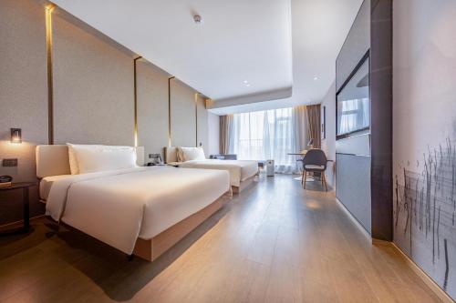 Imagen de la habitación del Hotel Atour Zhongshan North Station V-PARK Plaza. Foto 14