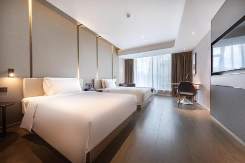 Imagen de la habitación del Hotel Atour Zhongshan North Station V-PARK Plaza. Foto 15