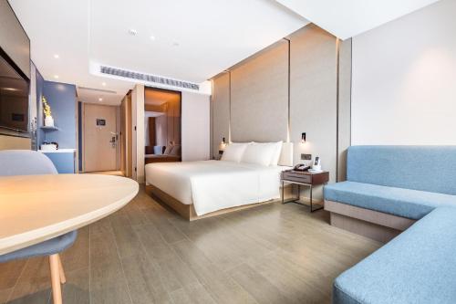 Imagen de la habitación del Hotel Atour Zhongshan North Station V-PARK Plaza. Foto 19