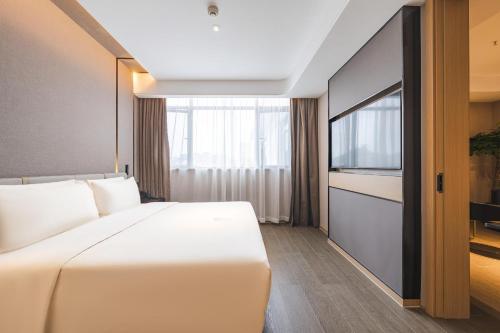 Imagen de la habitación del Hotel Atour Zhoushan Dinghai. Foto 16