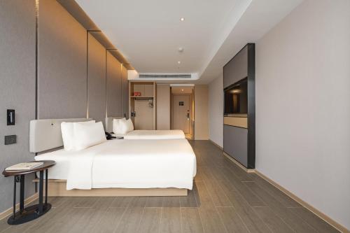 Imagen de la habitación del Hotel Atour Zhoushan Dinghai. Foto 18