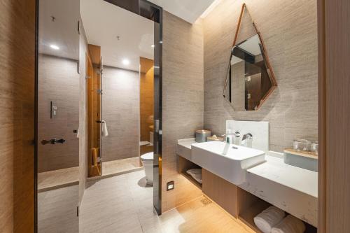 Imagen de la habitación del Hotel Atour Zhoushan Dinghai. Foto 20