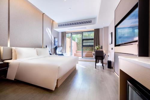 Imagen de la habitación del Hotel Atour Zhuhai High Tech Zone University Town Government Affairs Center. Foto 7