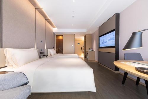 Imagen de la habitación del Hotel Atour Zhuhai High Tech Zone University Town Government Affairs Center. Foto 8