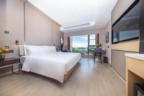 Imagen de la habitación del Hotel Atour Zhuhai High Tech Zone University Town Government Affairs Center. Foto 9