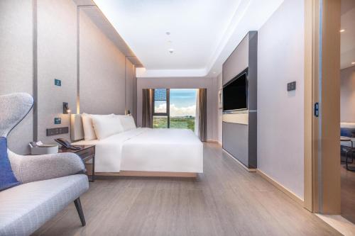 Imagen de la habitación del Hotel Atour Zhuhai High Tech Zone University Town Government Affairs Center. Foto 10