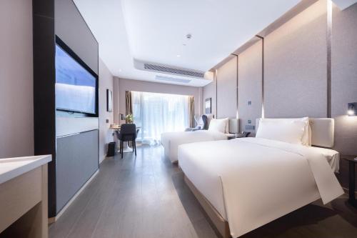 Imagen de la habitación del Hotel Atour Zhuhai High Tech Zone University Town Government Affairs Center. Foto 14