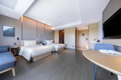 Imagen de la habitación del Hotel Atour Zhuhai High Tech Zone University Town Government Affairs Center. Foto 18