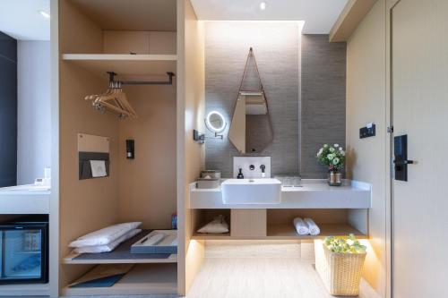 Imagen de la habitación del Hotel Atour Zhuhai High Tech Zone University Town Government Affairs Center. Foto 19