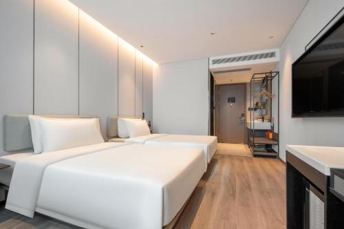 Imagen de la habitación del Hotel Atour Zhuhai Jinwan Airport. Foto 13