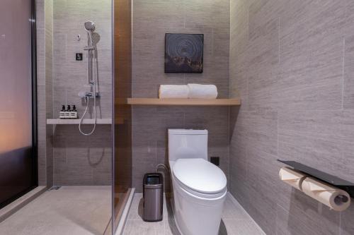 Imagen de la habitación del Hotel Atour Zhuhai Tangjiawan University Jinding Plaza. Foto 9