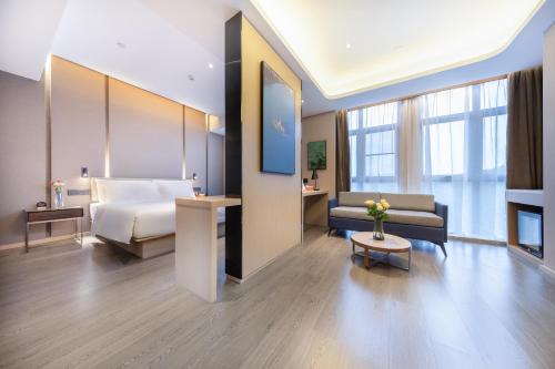 Imagen de la habitación del Hotel Atour Zhuhai Tangjiawan University Jinding Plaza. Foto 10