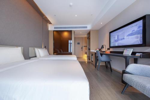 Imagen de la habitación del Hotel Atour Zhuhai Tangjiawan University Jinding Plaza. Foto 16
