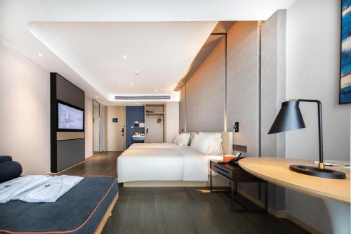 Imagen de la habitación del Hotel Atour Zhuhai Tangjiawan University Jinding Plaza. Foto 17