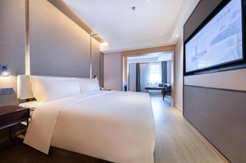 Imagen de la habitación del Hotel Atour Zhuhai Wanchai Port Hengqin International Convention and Exhibition Center. Foto 13