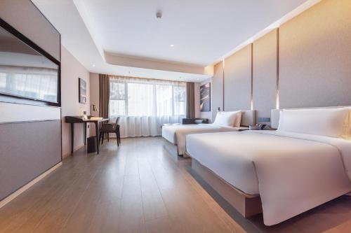 Imagen de la habitación del Hotel Atour Zhuhai Wanchai Port Hengqin International Convention and Exhibition Center. Foto 14