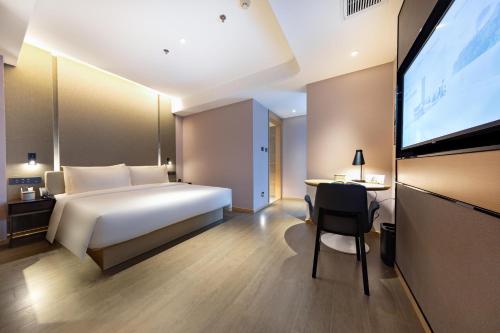 Imagen de la habitación del Hotel Atour Zhuhai Wanchai Port Hengqin International Convention and Exhibition Center. Foto 15