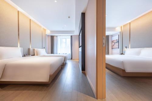 Imagen de la habitación del Hotel Atour Zhuhai Wanchai Port Hengqin International Convention and Exhibition Center. Foto 16