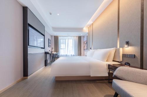 Imagen de la habitación del Hotel Atour Zhuhai Wanchai Port Hengqin International Convention and Exhibition Center. Foto 18