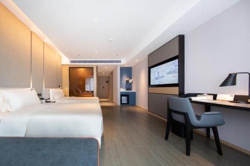 Imagen de la habitación del Hotel Atour Zhuhai Wanchai Port Hengqin International Convention and Exhibition Center. Foto 19