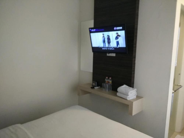Imagen de la habitación del Hotel Atreya Makassar. Foto 2