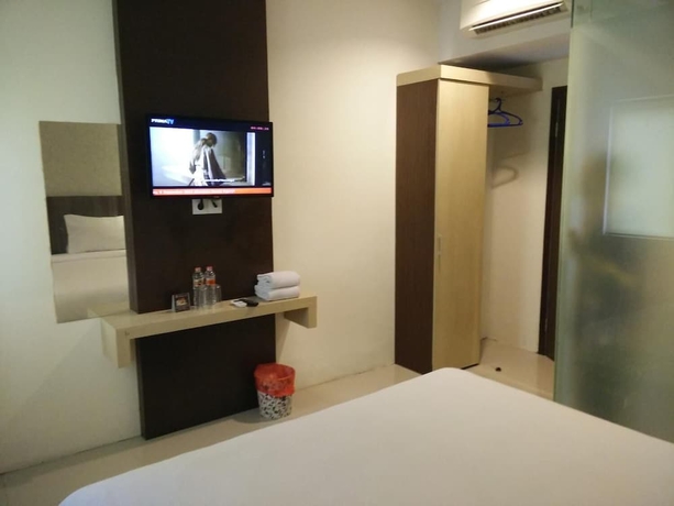 Imagen de la habitación del Hotel Atreya Makassar. Foto 4