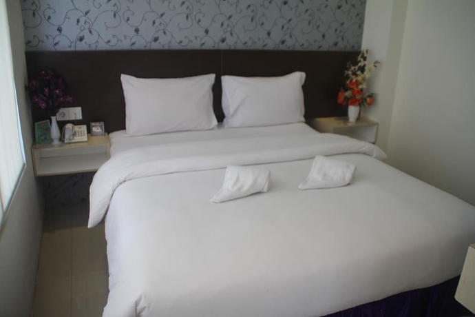 Imagen de la habitación del Hotel Atreya Makassar. Foto 9