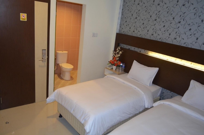 Imagen de la habitación del Hotel Atreya Makassar. Foto 12