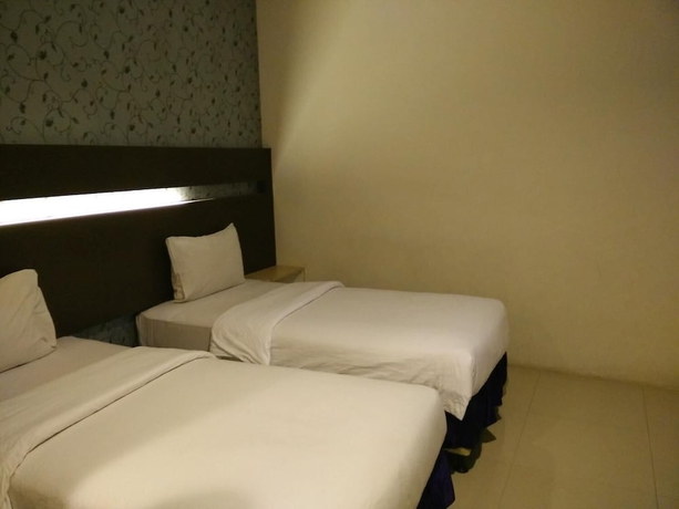 Imagen de la habitación del Hotel Atria Inn. Foto 13