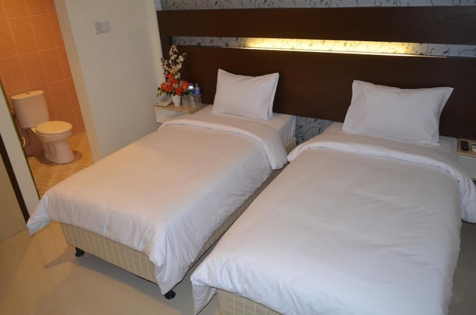 Imagen de la habitación del Hotel Atria Inn. Foto 15