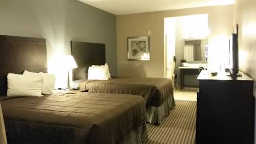 Imagen de la habitación del Hotel Atria Inn and Suites. Foto 5